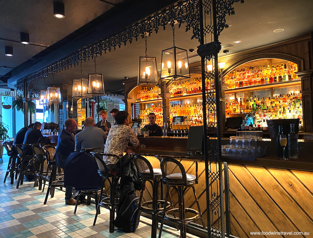 Wrought iron work over the bar at NOLA takes us right back to New Orleans.