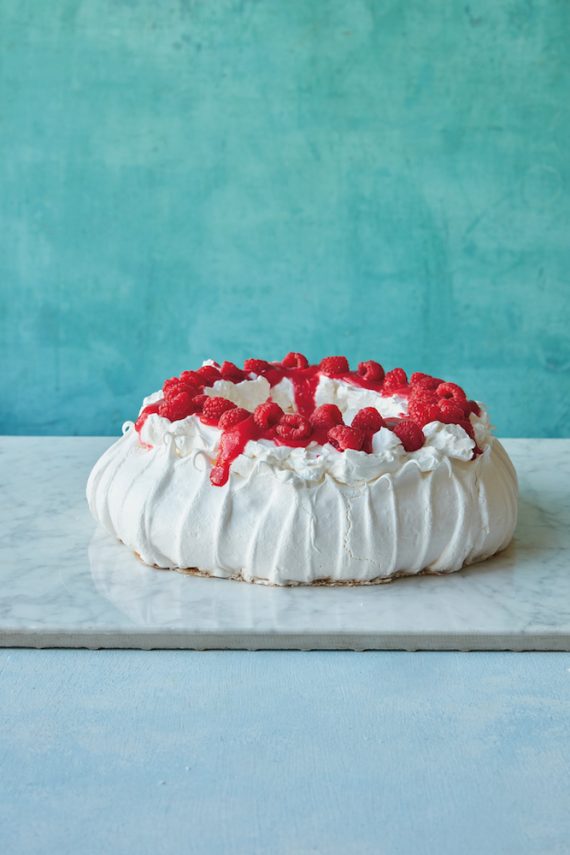 Make this show-stopping Raspberry Pavlova with aquafaba. Recipe from Simply Vegan Baking.