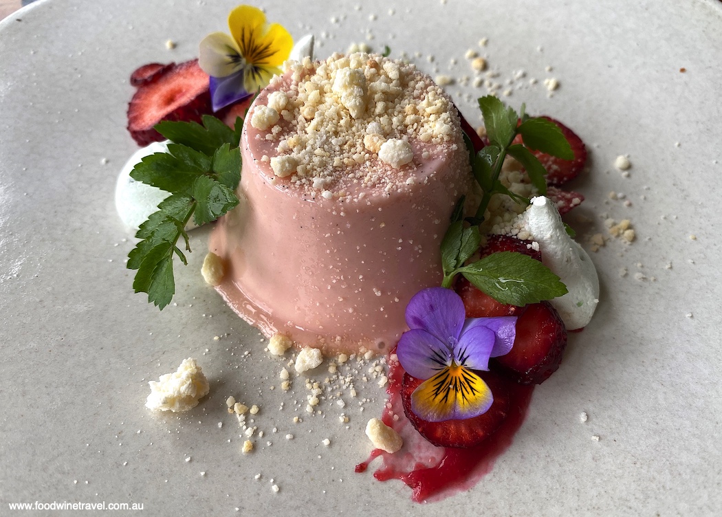 Potager's Strawberry and elderflower panna cotta with rosella gel, strawberries, and basil meringue.