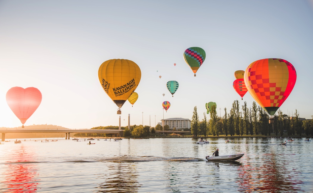 The Canberra Balloon Spectacular takes off over Lake Burley Griffin in March.