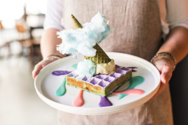 Space Kitchen at Woden does eye-catching dishes for kids, aka this Unicorn Waffle. Photo: Visit Canberra.