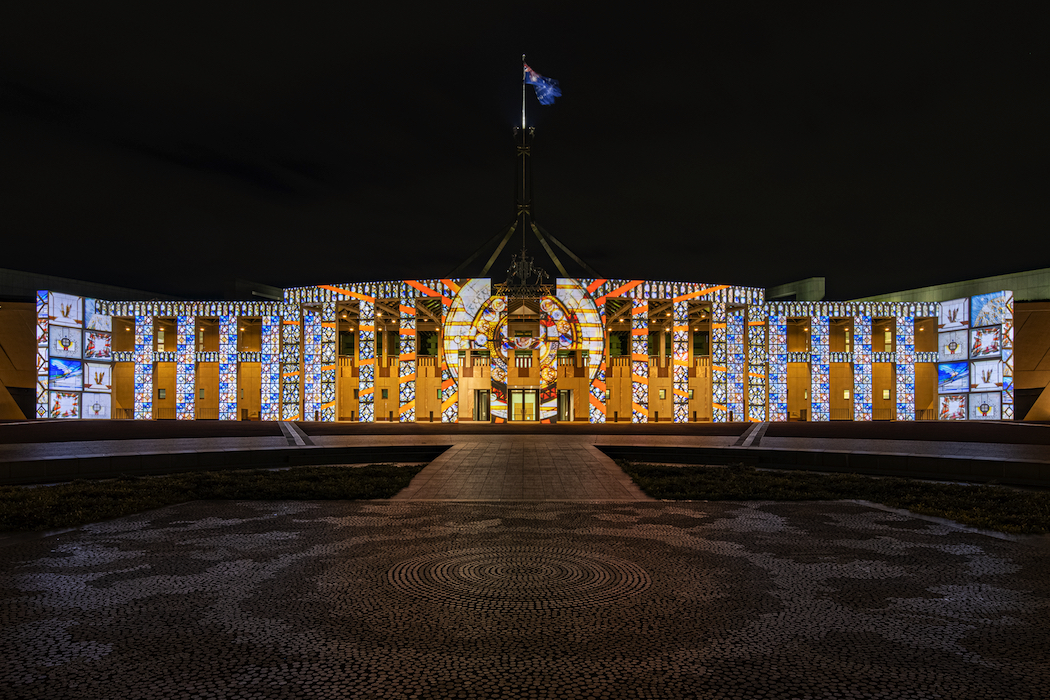 Parliament House under the spotlight during Enlighten. (Photox - Canberra Photography Services)