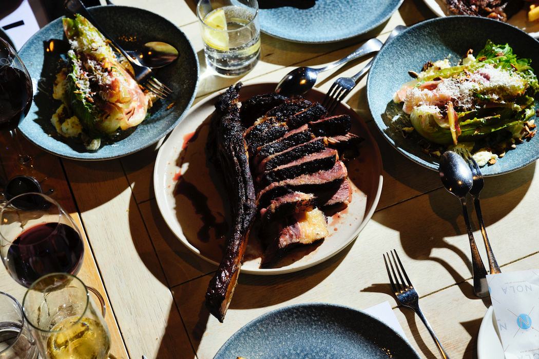 Portaro's mouth-wateringly tender tomahawk steak, available at NOLA on Thursdays during Meat March.