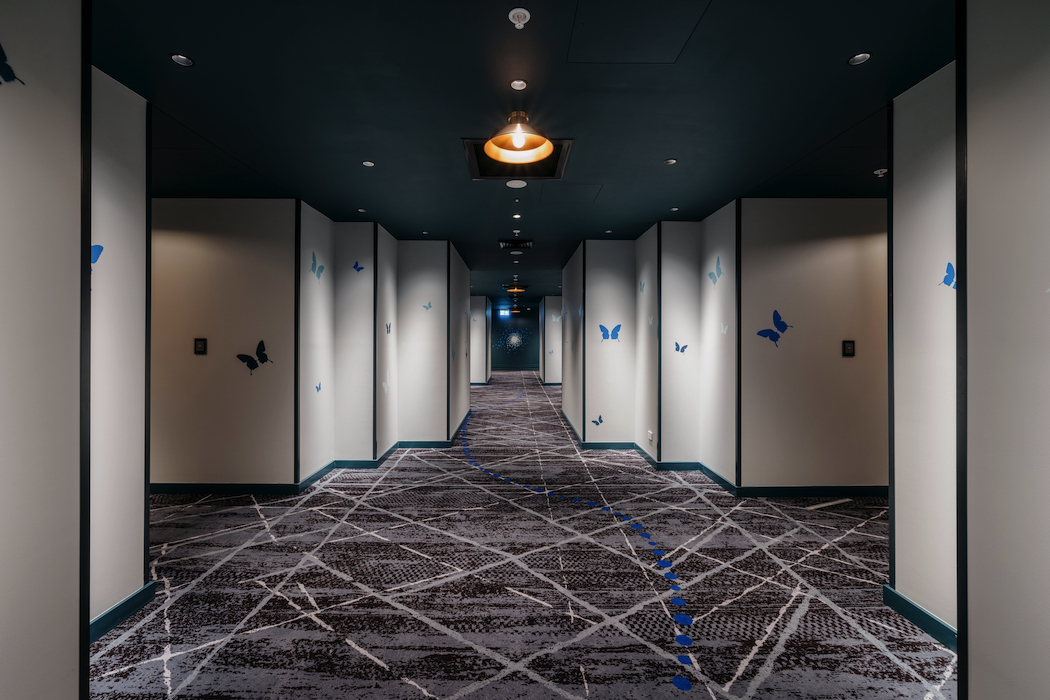 Butterfly motifs are everywhere, including the hotel corridors.