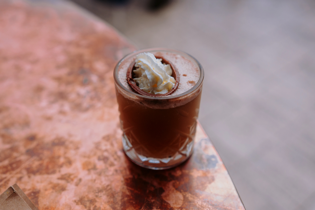 Tipsy Bunny, made with vodka liqueur and a Cadbury crème egg muddled into a shaker. 