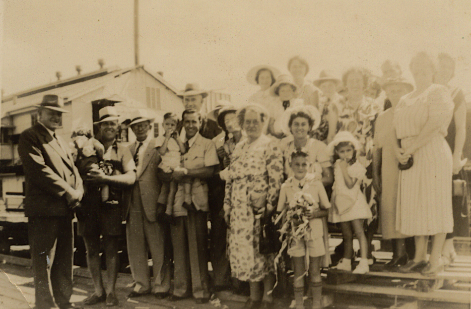Mum (middle row, third from right) being farewelled at Hamilton Wharf, 1951.