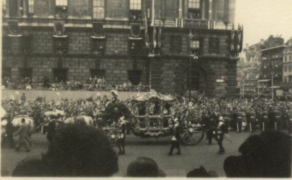 Queen Elizabeth II passing by in the Gold State Coach.