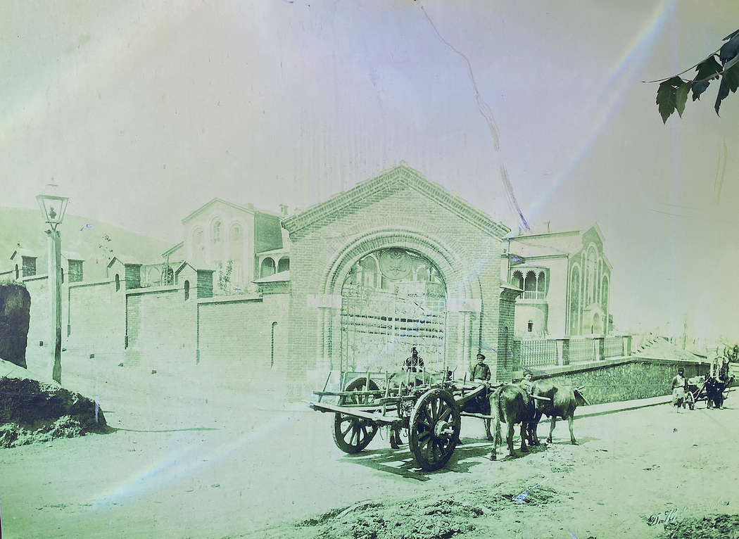 Historic photo of the old Wine Factory on display in the grounds.