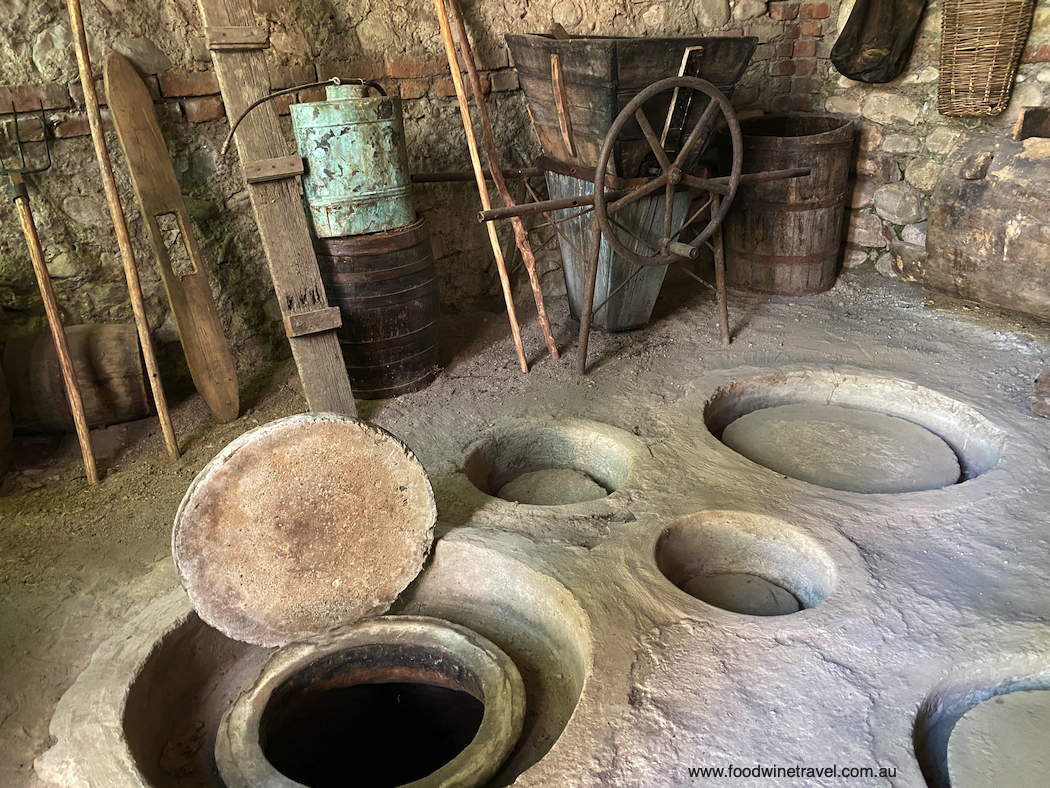 Qvevri in a backyard in Georgia's Kakheti wine region, a winemaking tradition recognized by UNESCO.