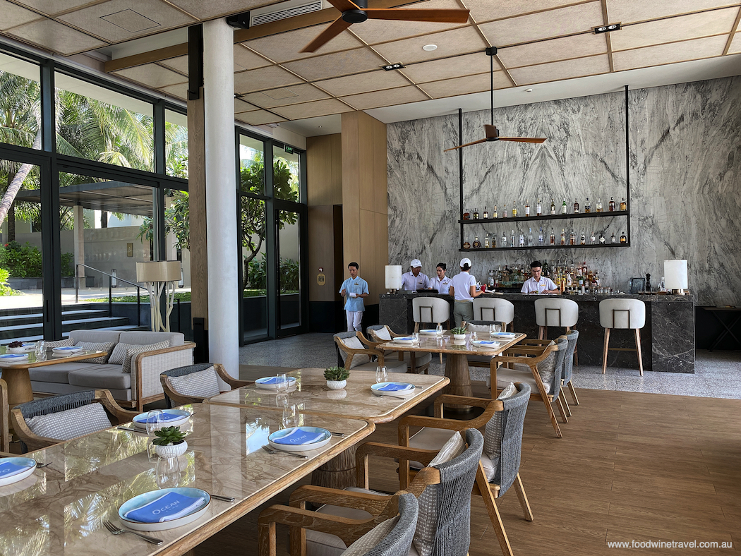 Ocean Club has a casual chic ambience and a Mediterranean-inspired menu, including woodfired pizzas like the one below.