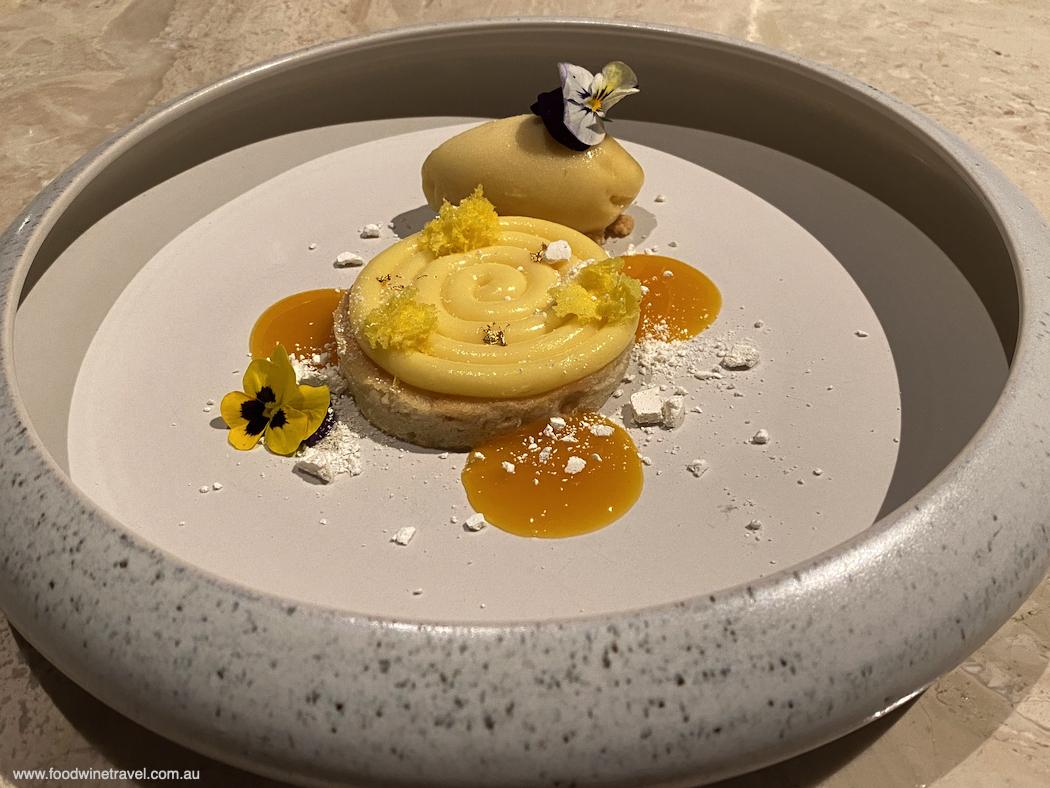 Ocean Club's Yuzu tart with orange sable, mango sorbet and lemon meringue.