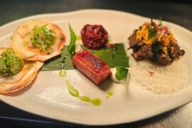 Oak & Vine's signature trio, from left: Scallops with coconut & coriander; Treacle & fennel glazed duck breast; Black pepper pork dry curry.