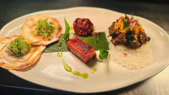 Oak & Vine's signature trio, from left: Scallops with coconut & coriander; Treacle & fennel glazed duck breast; Black pepper pork dry curry.