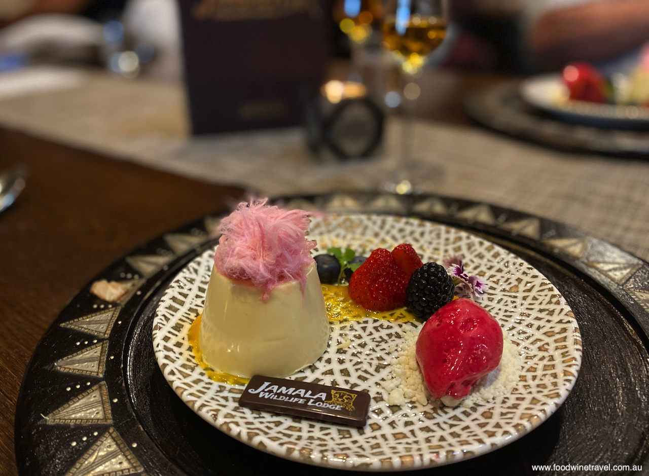 The Lodge's pretty dessert of Vanilla panna cotta with mango puree, Persian floss and raspberry sorbet.