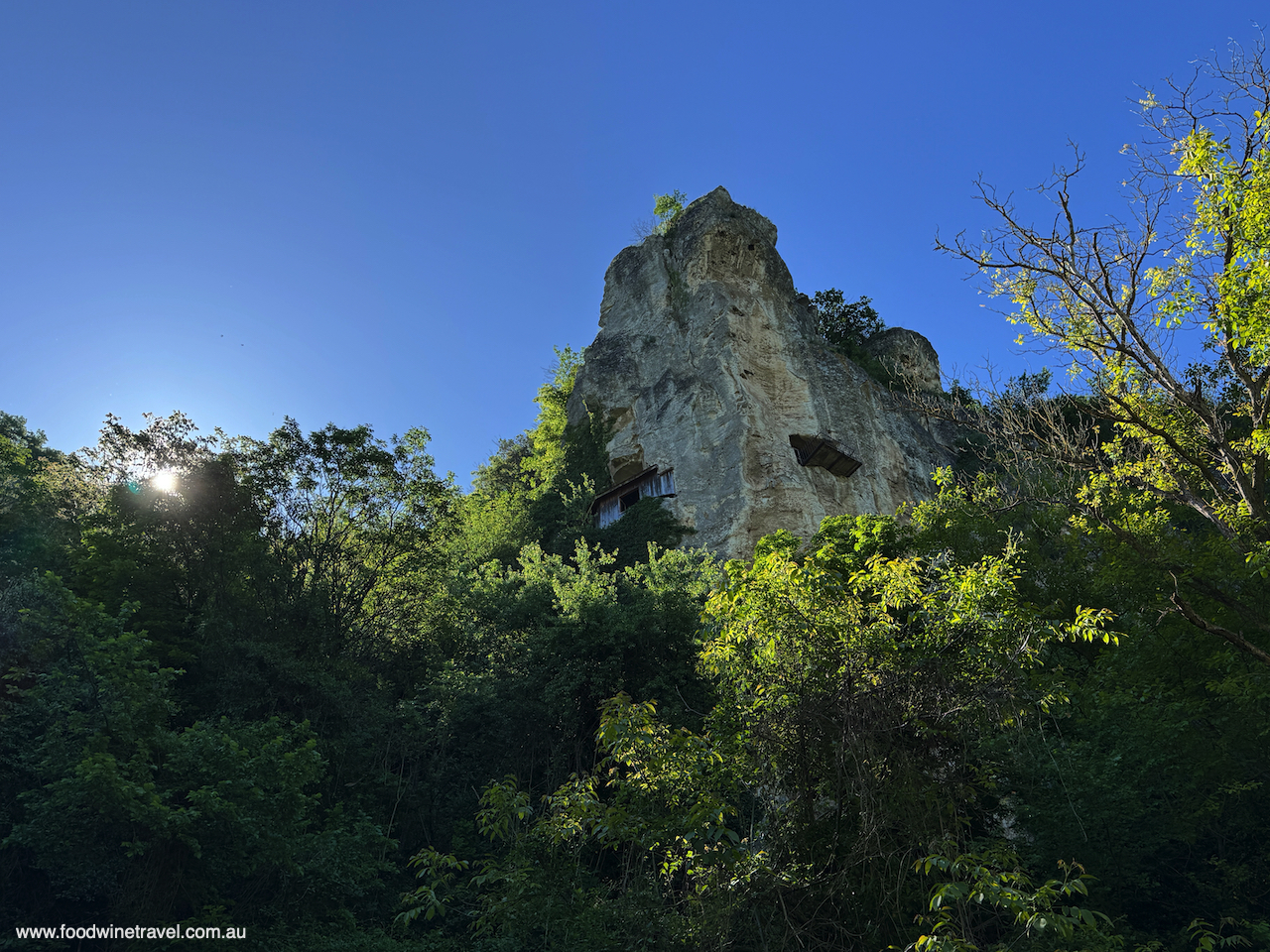 Looking up to the Holy Mother of God Church carved out of rock in Ivanovo, Bulgaria.