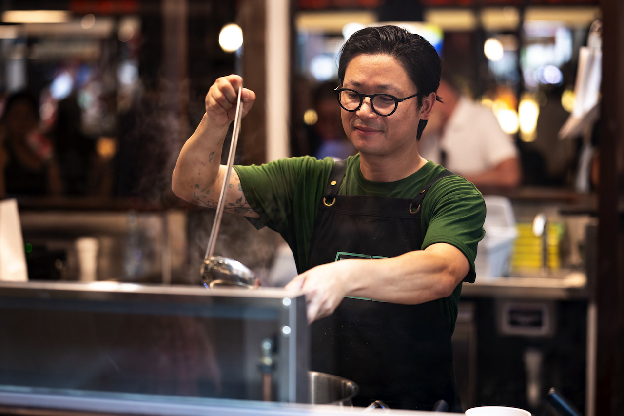 Luke Nguyen serves his family's pho recipe at Pho Chu Lap in Hay St Market, Sydney.