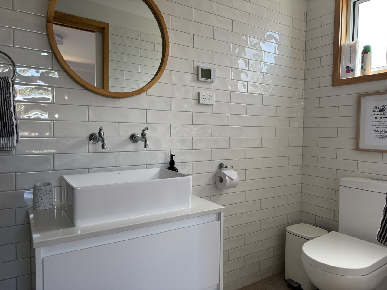 The generously sized bathroom at Church Lane has a heated floor.