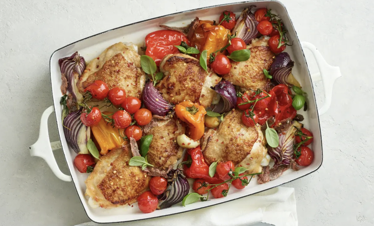Mediterranean Chicken Traybake, made with Cobram Estate extra virgin olive oil.