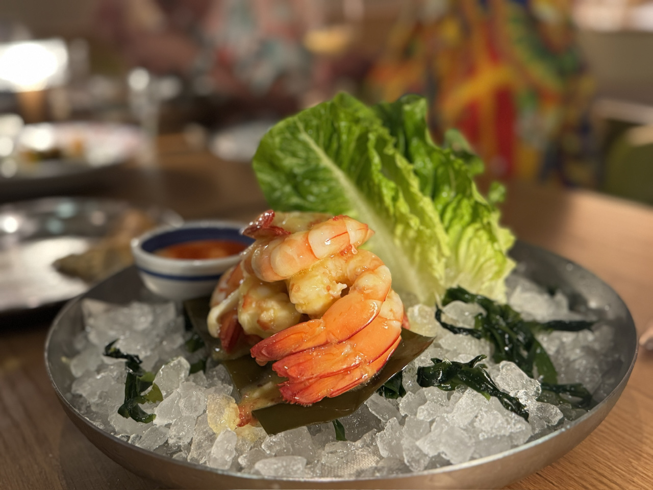 Cibaria’s deconstructed Prawn Cocktail with poached king prawns, finger lime, cos lettuce and salsa aurora.