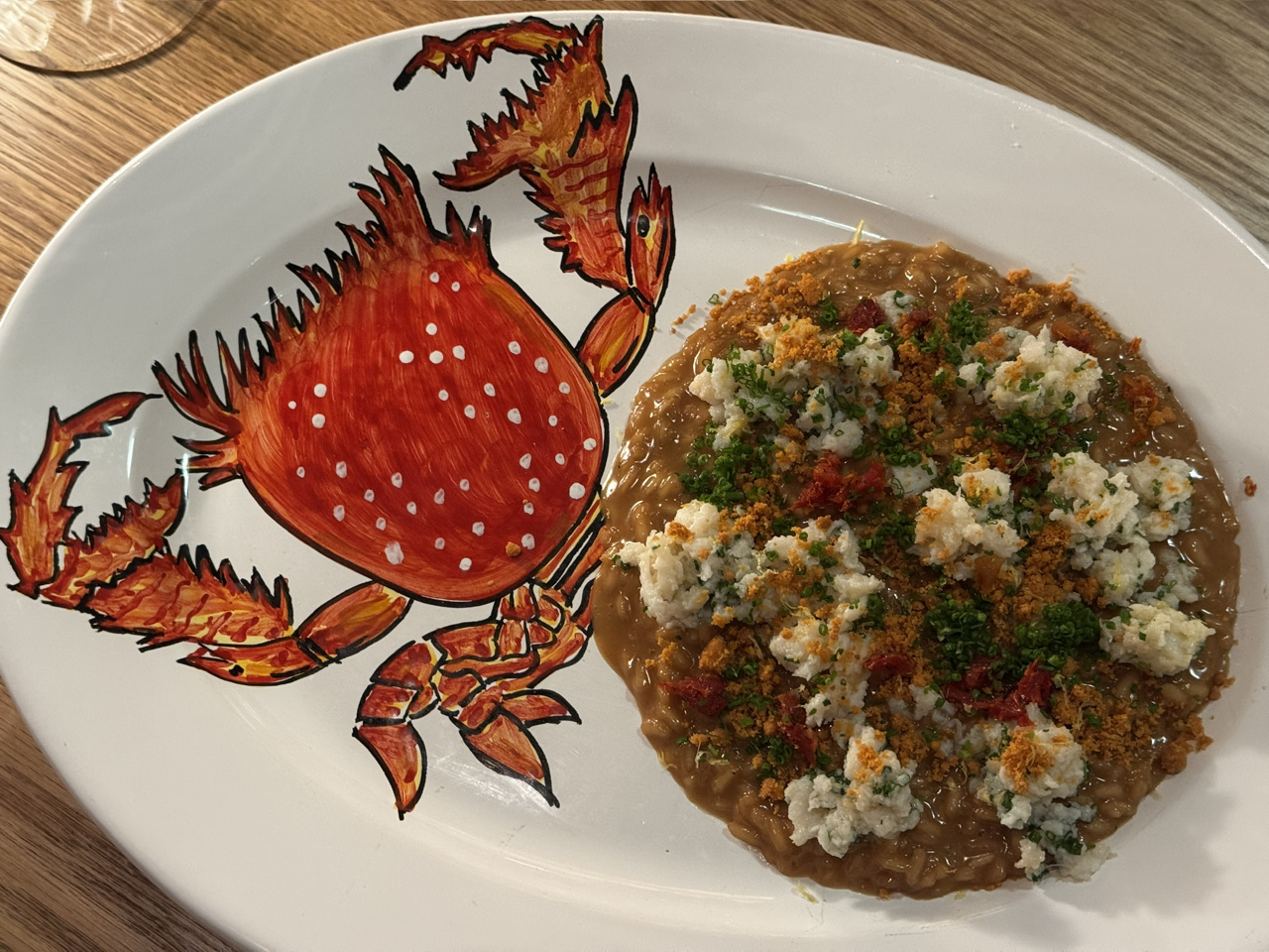 Cibaria Noosa Risotto al Granchio, Pavoni’s signature aged Carnaroli rice prepared all’onda with Queensland spanner crab and local tomatoes.