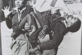 Sam Nzima’s photo of Mbuyisa Makhubo carrying the mortally wounded Hector Pieterson.