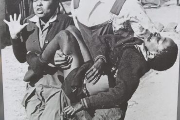 Sam Nzima’s photo of Mbuyisa Makhubo carrying the mortally wounded Hector Pieterson.