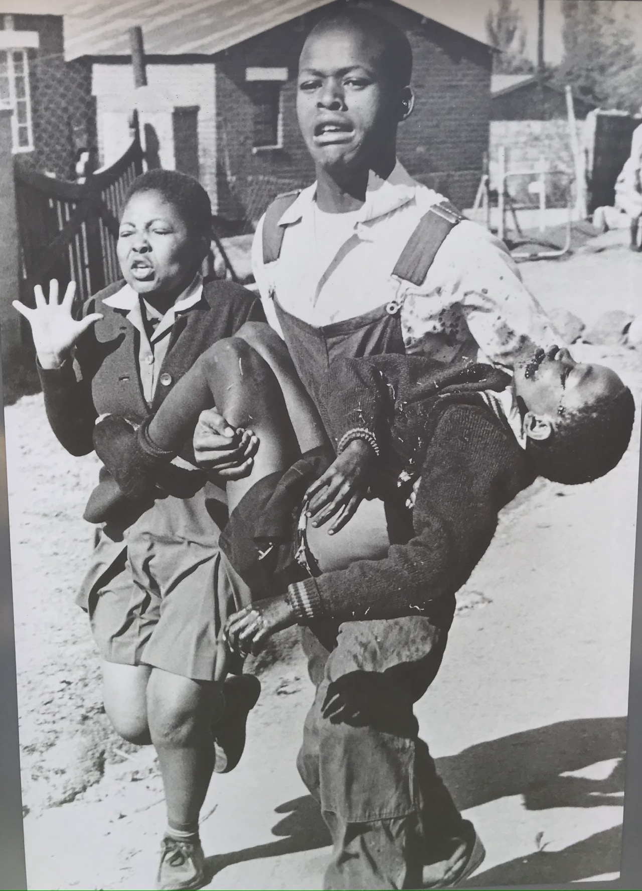 Sam Nzima’s photo of Mbuyisa Makhubo carrying the mortally wounded Hector Pieterson.