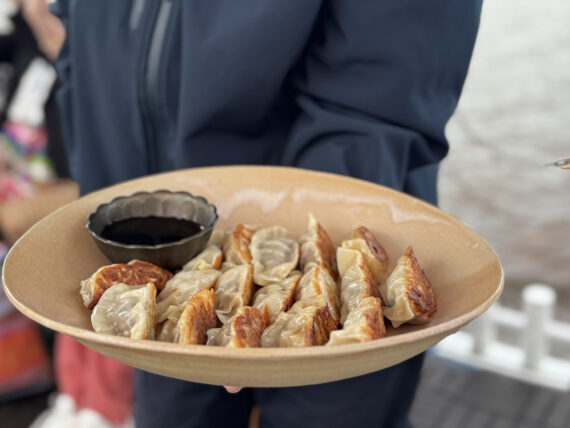 Gyozas, the finished product, served to us with ponzu dipping sauce.