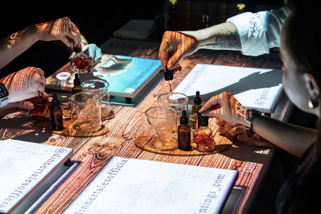 The 7 Paintings experience at Sofitel Brisbane Central kicks off with mixing your own Negroni.