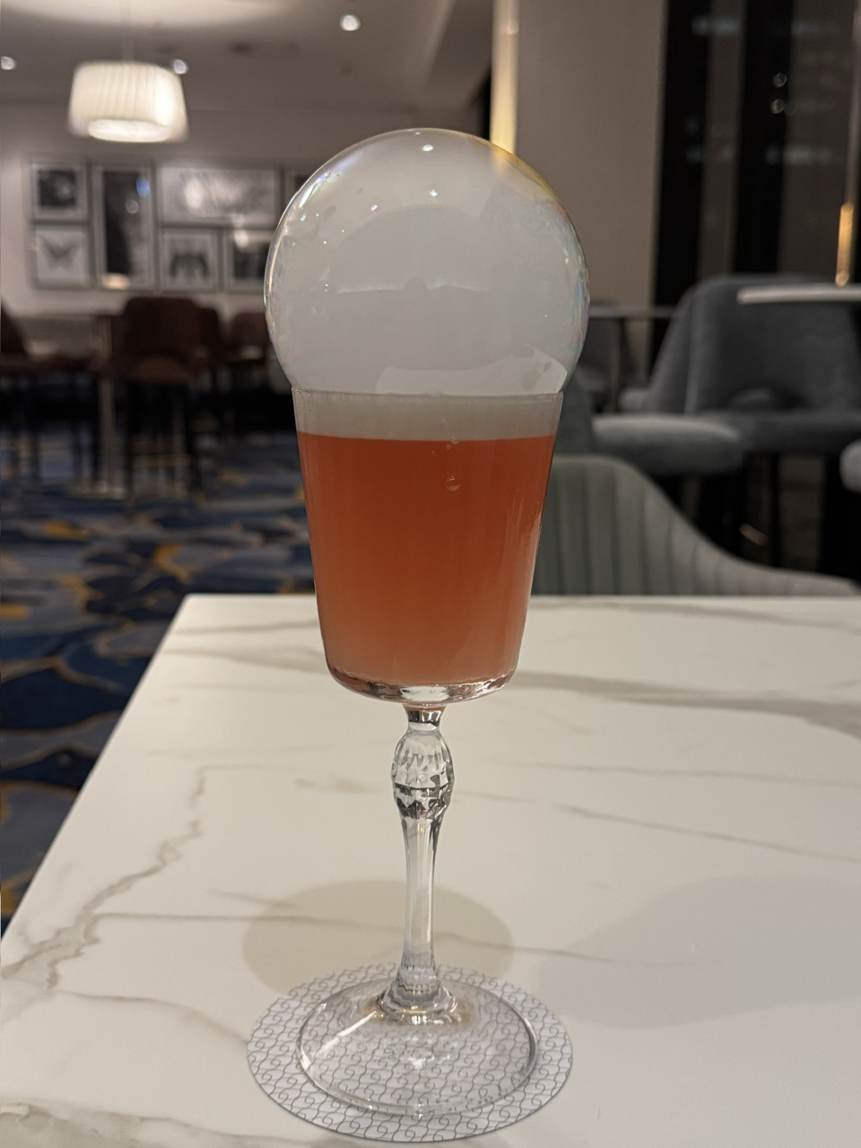Rosé Reverie cocktail with a bubble on top!