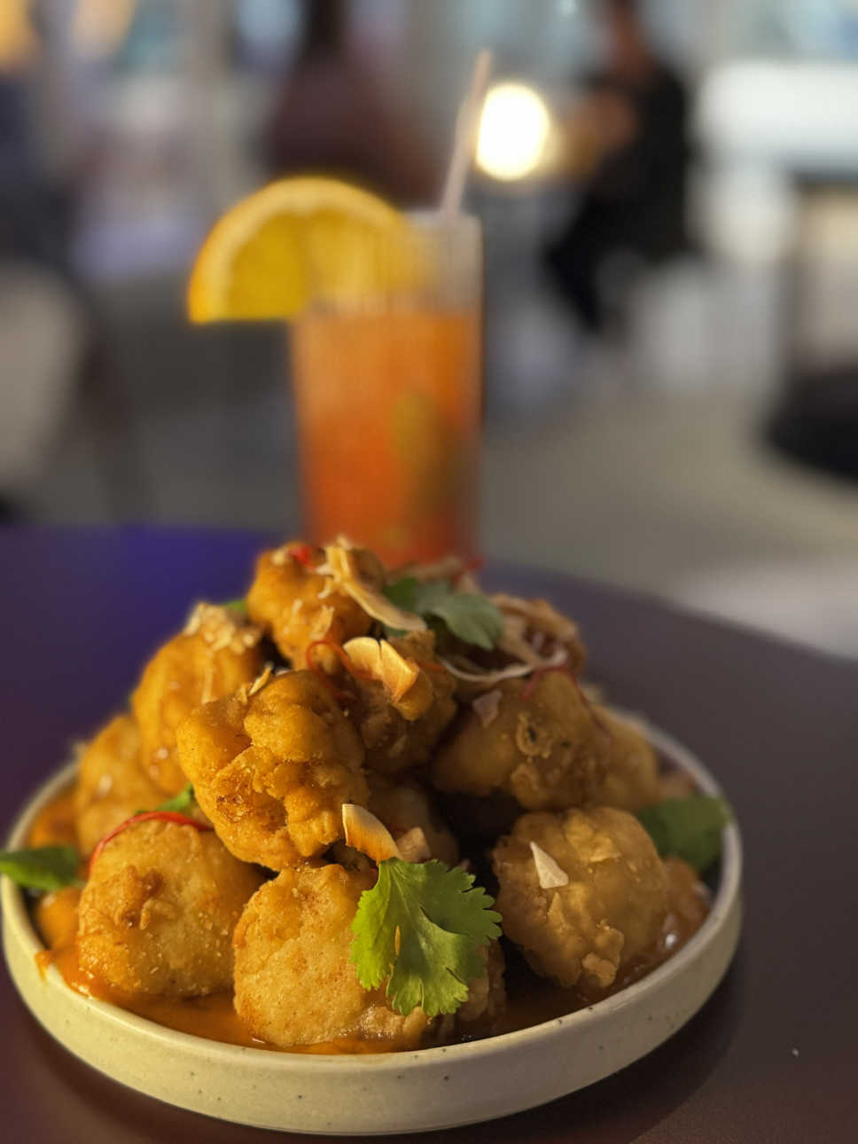 Cauliflower bites with Sherbet Shirley mocktail, Kokomo restaurant. Photo © FoodWineTravel