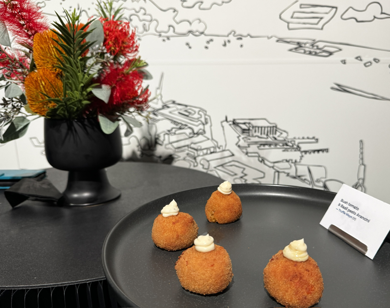 Bush tomato and basil pesto arancini with truffle mayo, canapés served at SkyHouse After Hours.